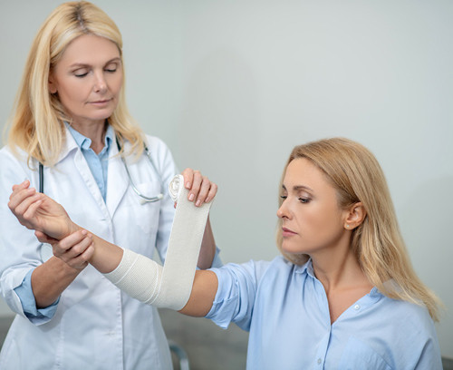 What is a pathological fracture and how does it differ from a normal fracture?