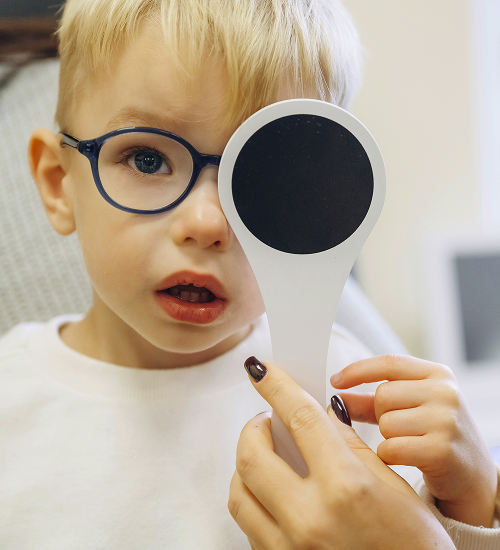 An appointment with a paid pediatric ophthalmologist at a modern ophthalmology clinic.