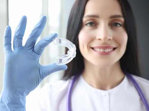 How is open bite correction performed?