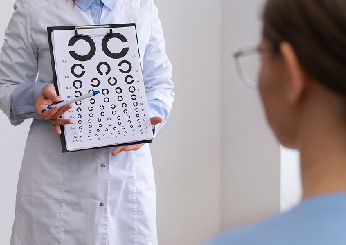 How is vision testing performed?