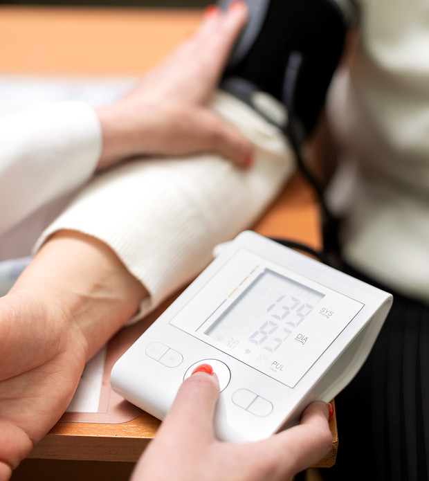 Why does retinal damage develop with high blood pressure?
