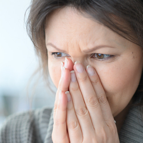 What is dacryocystitis and why does it occur?